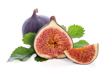 Ripe figs with leaves over white