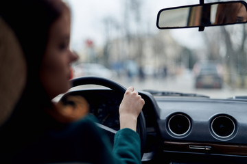 Woman driving a car, a woman is driving in a car