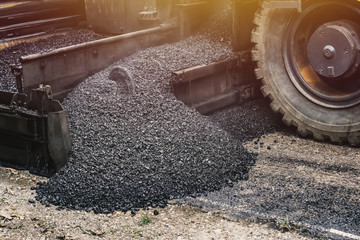 Asphalt pavement machinery working.