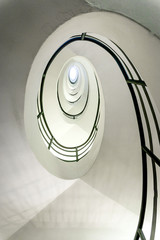 Modern spiral staircase looking up
