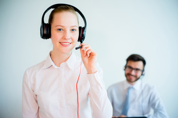 Female smiling call center operator
