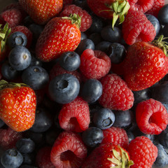 A Serving of Fresh Strawberries, Raspberries and Blueberries in Germany, Europe