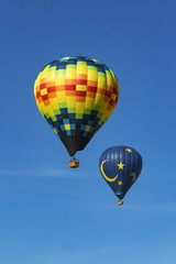 Balloons fly over California grape vineyard and winery during Hot Air Balloon Festival