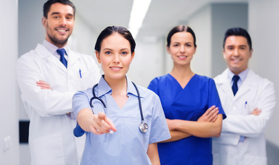 group of medics pointing finger on you at hospital