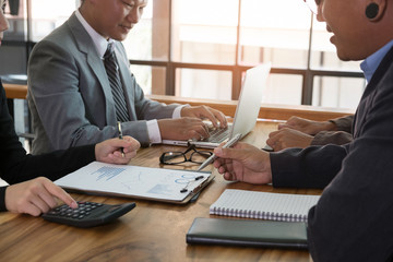 young business people and entrepreneur working around table in office. teamwork, collaboration, corporate concept.