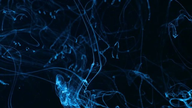 Cloud of ink floating slowly trough space, close up, black background abstract wallper