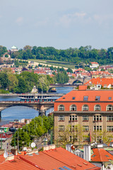 Obraz premium Prague view with bridges on Vltava river, Czech Republic. Architecture and landmark, vertical postcard of Prague