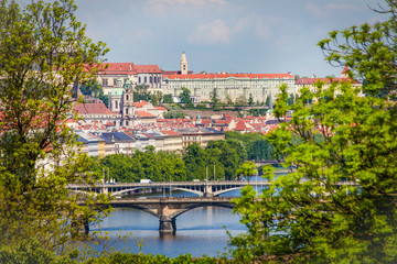 Obraz premium Famous Vltava river with bridges in Prague, Czech Republic. Landmarks of Prague, postcard of Prague