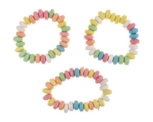 Three stretchable candy bracelets isolated on a white background.