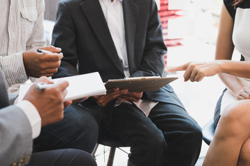 young business people having a meeting in office. Conference, discussion, teamwork, collaboration, corporate concept.