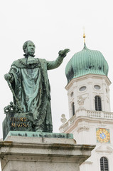 Fototapeta na wymiar Statue of Maximillian Joseph which stands in the courtyard of the St Stephens Basilica in Passau, Germany
