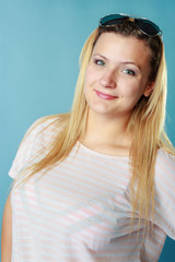 Fototapeta premium Blonde woman wearing sunglasses and summer clothing
