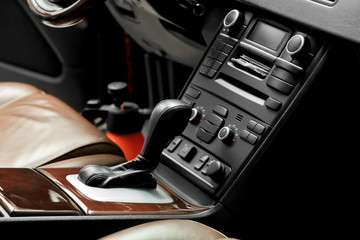 Fototapeta na wymiar Change-gear lever in modern car salon