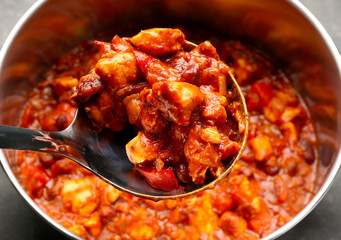 Ladle with delicious chili turkey, closeup