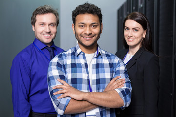 Happy joyful team standing together