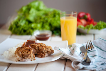 Crispy Chicken Fillets on white plate