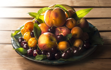 Tray with fruits on the wooden table