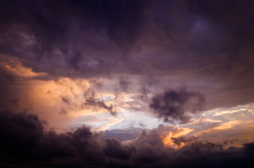 Fototapeta na wymiar Storm clouds in the sunset light