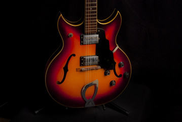 Fototapeta na wymiar old retro colorful electric guitar