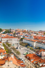 Fototapeta na wymiar Lisbon skyline from Santa Justa Lift. Building in the centre is National Theatre D. Maria II on Rossio Square (Pedro IV Square) in Lisbon Portugal