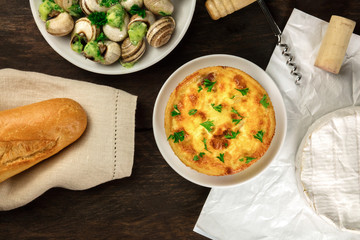 Photo of French foods on rustic texture with copyspace
