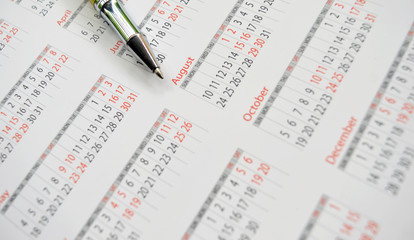 Obraz premium Pen on Calendar 