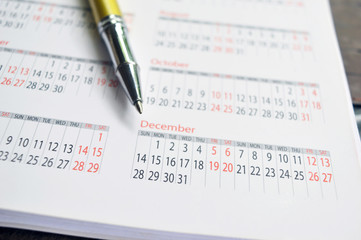 Obraz premium Pen on Calendar 