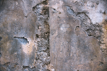 Grunge cement wall with aged, rough surface