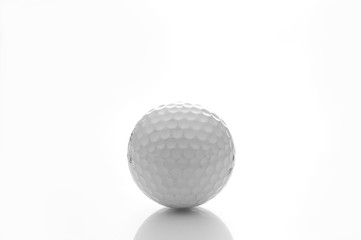 Golf ball on a white