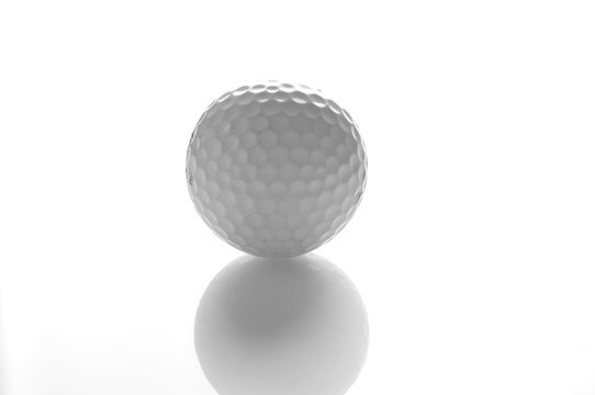 Golf ball on a white
