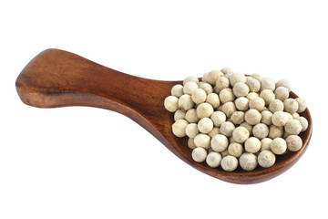 Wooden spoon and peppercorn on white background