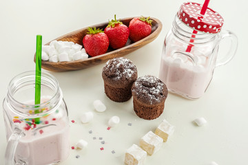 Chocolate cake yogurt with strawberries and pastille