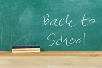 text back to school on blackboard or chalkboard
