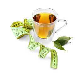 Weight loss concept. Cup of tea and measuring tape isolated on white