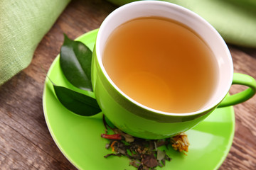 Cup of tea on wooden background