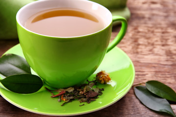 Cup of tea on wooden background