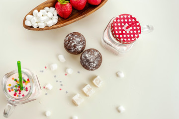 Chocolate cake yogurt with strawberries and pastille