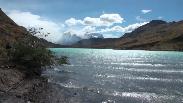 Mountain river and relax in Patagonia Argentina. Unique landscape of wildlife. Beautiful nature background. Travel and tourism in picturesque world of stone rocks and hills.