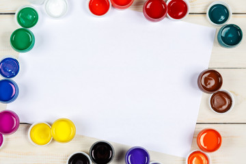 Concept of painting on the white wooden background