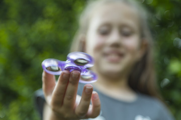 A fidget spinner popular toy for increased focus, stress relief.