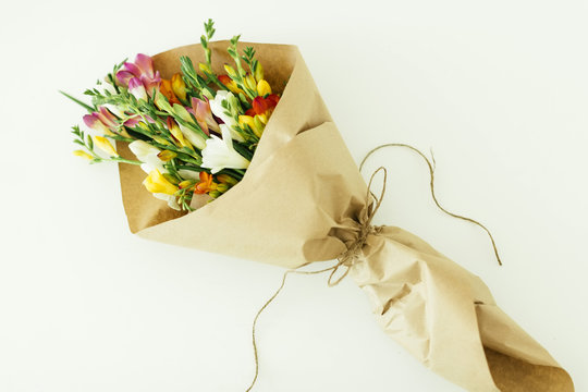 Bouquet wrapped in paper