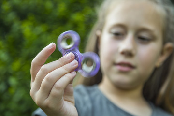 A fidget spinner popular toy for increased focus, stress relief.