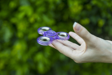 A fidget spinner popular toy for increased focus, stress relief.