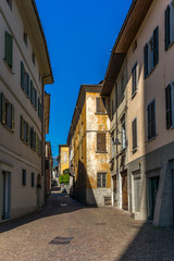 Fototapeta na wymiar View of the narrow streets of Tirano in Italian Valtellina - 9