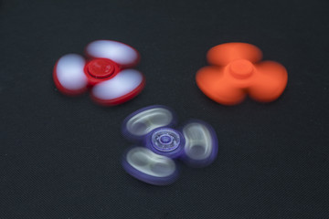 A fidget spinner popular toy for increased focus, stress relief.