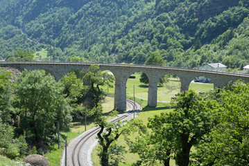 Fototapeta na wymiar Circular viaduct bridge near Brusio on the Swiss Alps - 1