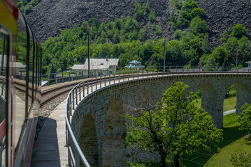 Fototapeta na wymiar Circular viaduct bridge near Brusio on the Swiss Alps - 4