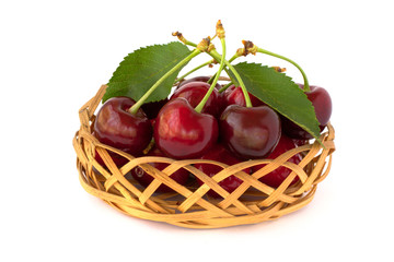 Many fresh cherries are on the white background