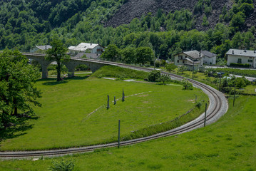 Circular viaduct bridge near Brusio on the Swiss Alps - 8