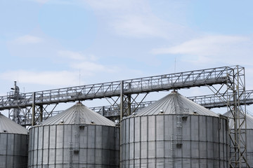 Elevators for storage of grain stocks against the blue sky